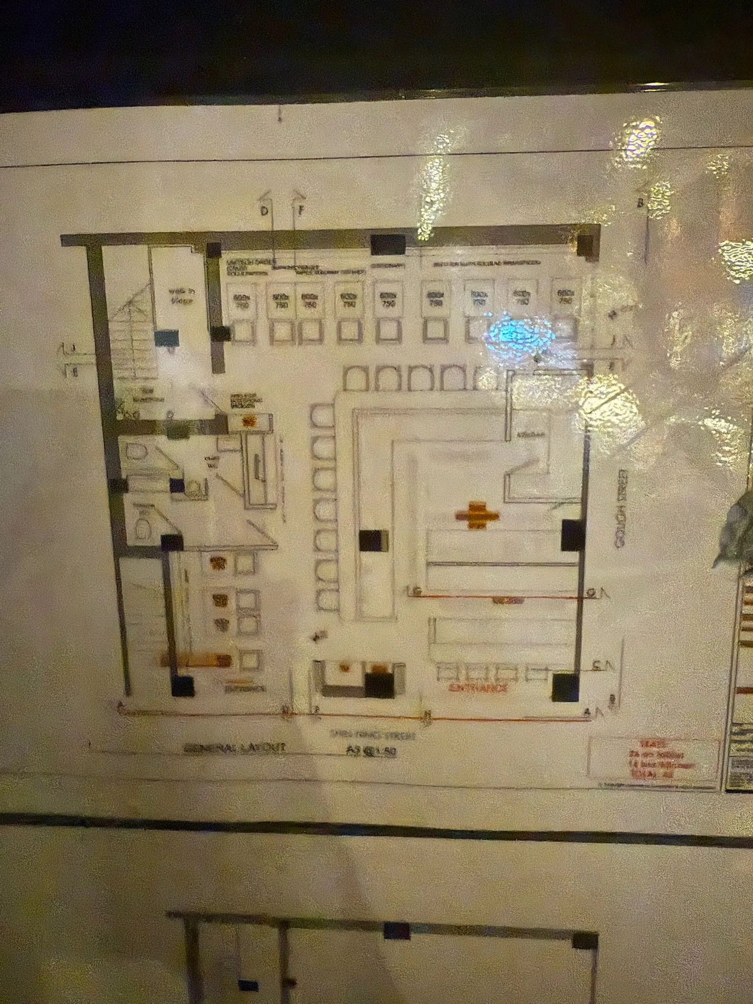 Ref#3654: A floor plan photo featuring multiple rooms, tables, and seating areas ideal for renting restaurant or shop space. Some labels and measurements are visible, though much of the text is unclear.