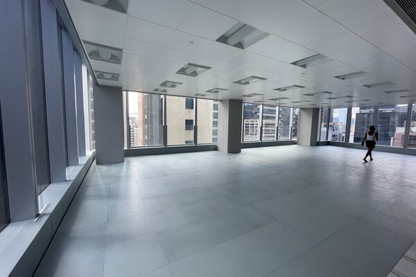 Ref#3205: Spacious office with large floor-to-ceiling windows and city views. Modern appeal is highlighted by its open layout and natural lightideal for those seeking rental office space.