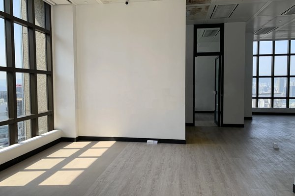 Ref#3317 features a bright, modern office with floor-to-ceiling windows and light wood flooring. Sunlight fills the space, making it ideal for those seeking a welcoming, professional rental office environment.