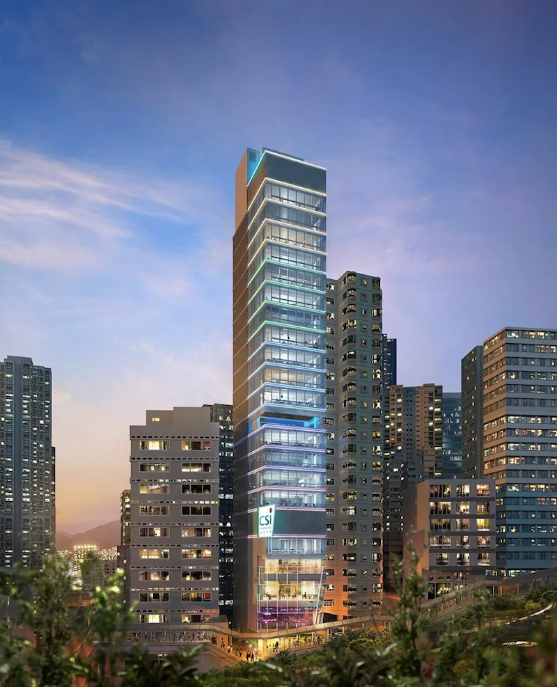 Restaurant space on Shelley Street, Central. Glass skyscraper with lit edges towers above Shelley Street at dusk, surrounded by shorter residential buildings.