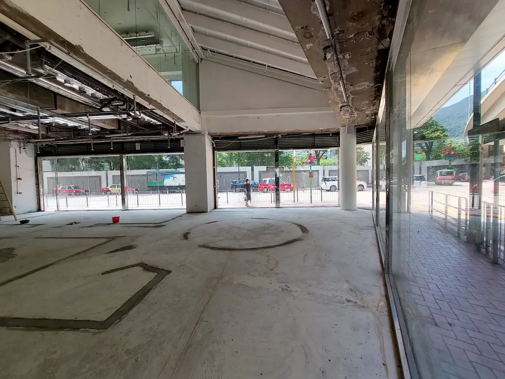 Empty unfinished interior with large windows that overlook Leighton Road in Causeway Bay.