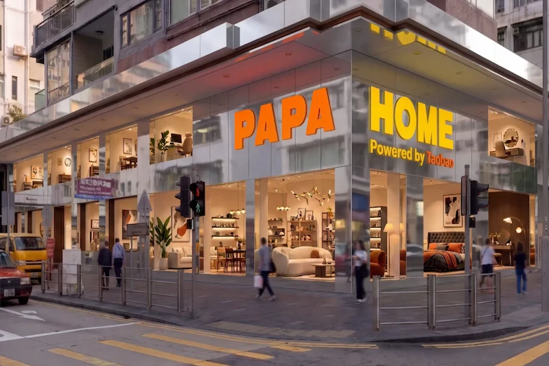 Street view of PapaHome furniture store in Causeway Bay, featuring large windows and people walking outside.