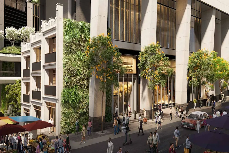 Central Crossing city street with pedestrians, trees, parked cars, and modern buildings featuring vertical greenery.