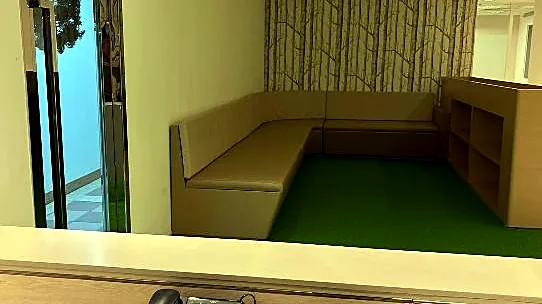 Office at One Mong Kok Road Commercial Centre, Mong Kok: reception lounge and bookshelves