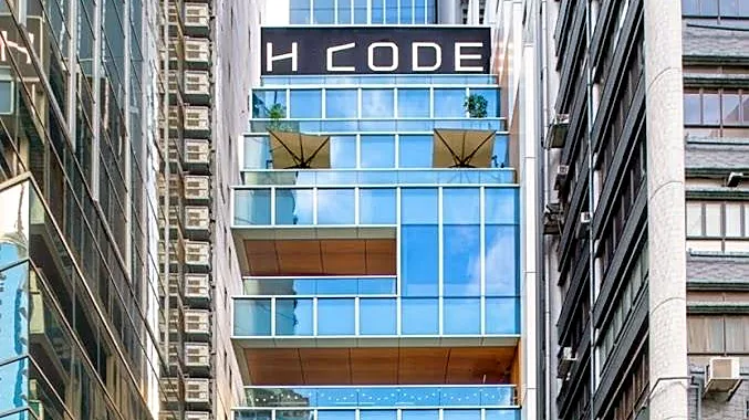 Restaurant space at H Code, Central – daytime view of the H Code façade above Pottinger Street