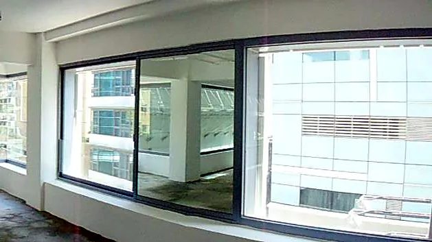 Office at W Place, Central. Sliding windows along the side elevation.