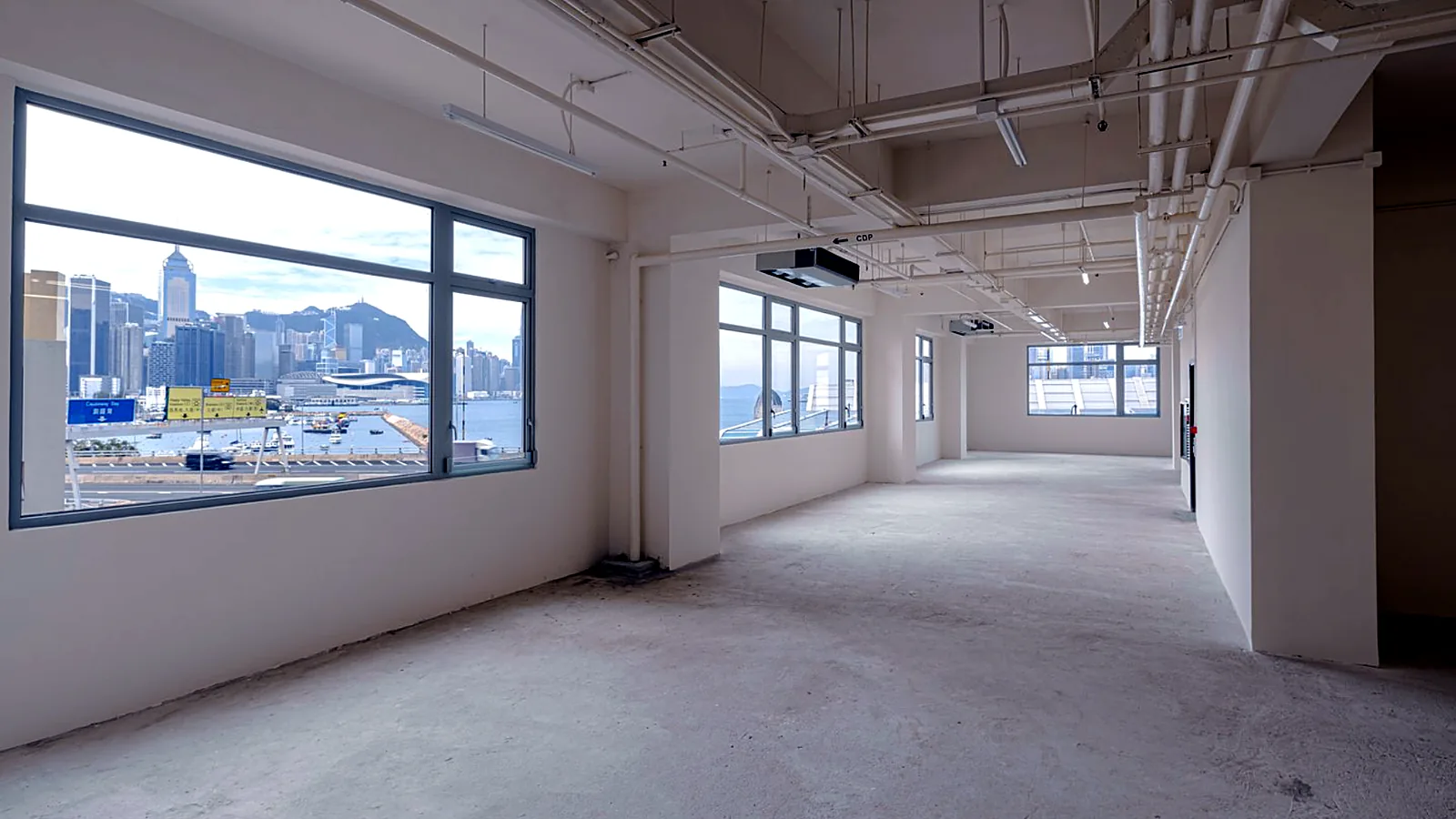 Office at Victoria Centre, North Point – open floor with harbour and Hong Kong Island views