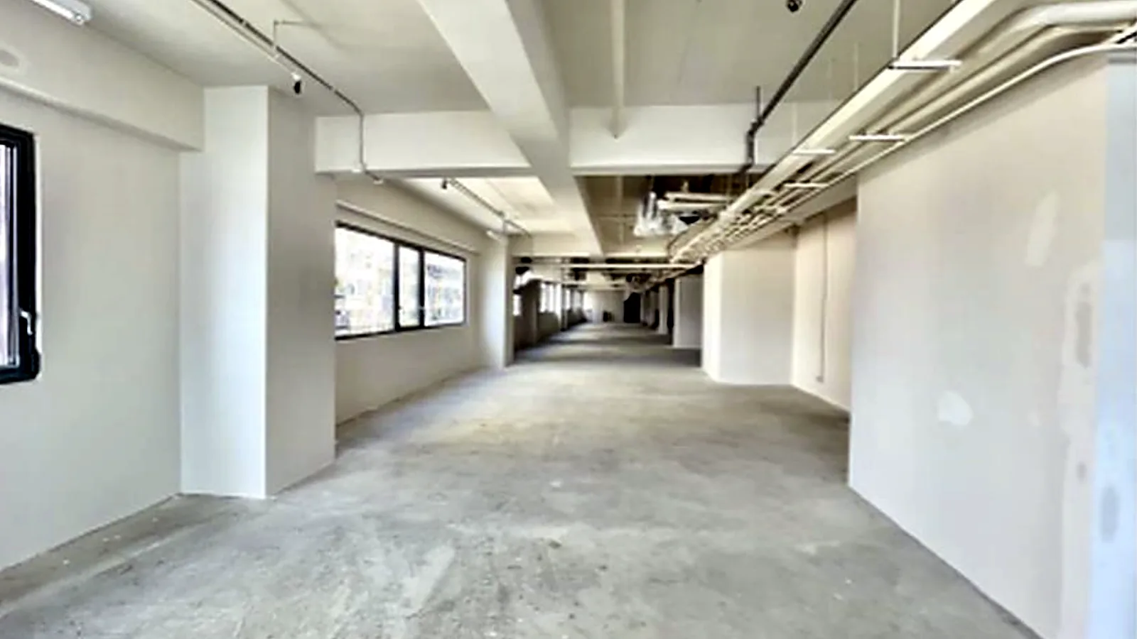 Office at Victoria Centre, North Point – long open-plan floor plate ready for fit-out