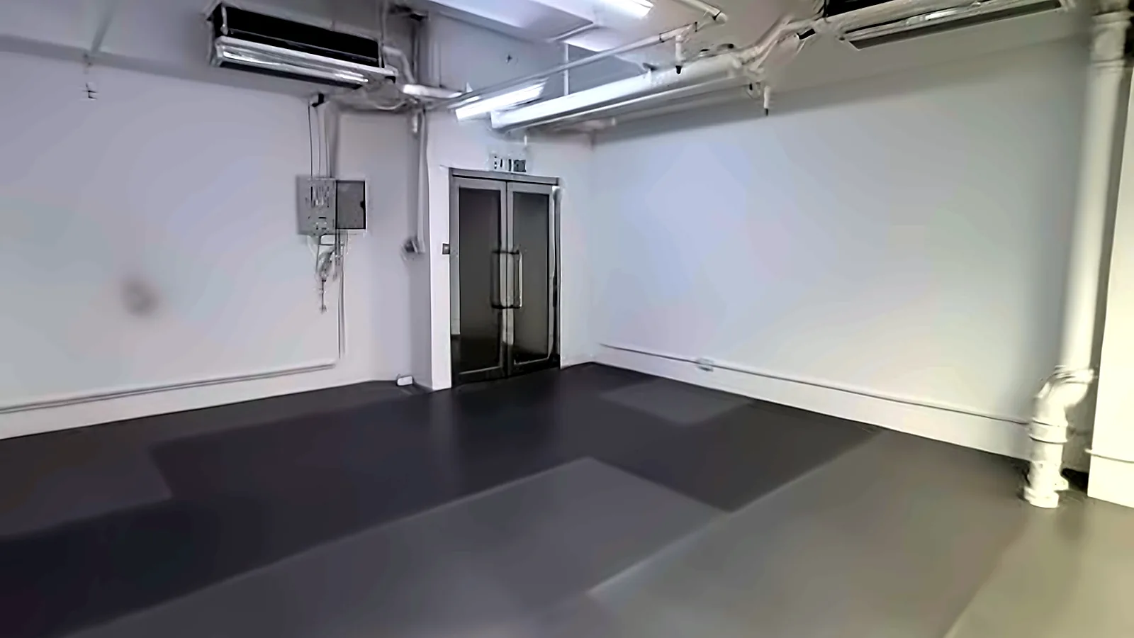 Office at Yan's Tower, Wong Chuk Hang – corner near the exit doors