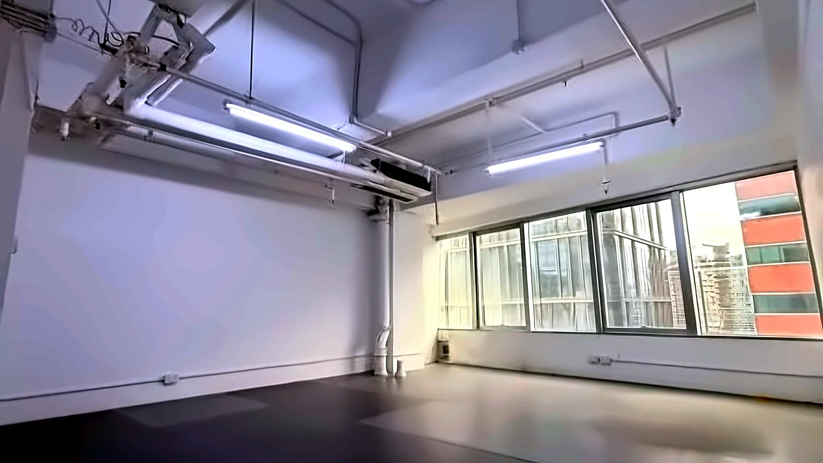 Office at Yan's Tower, Wong Chuk Hang – window wall and city view
