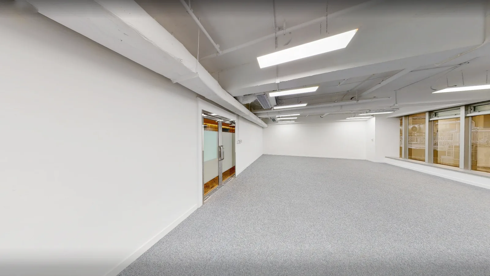 Office at On Hing Building, Central – angled wall with doors and windows