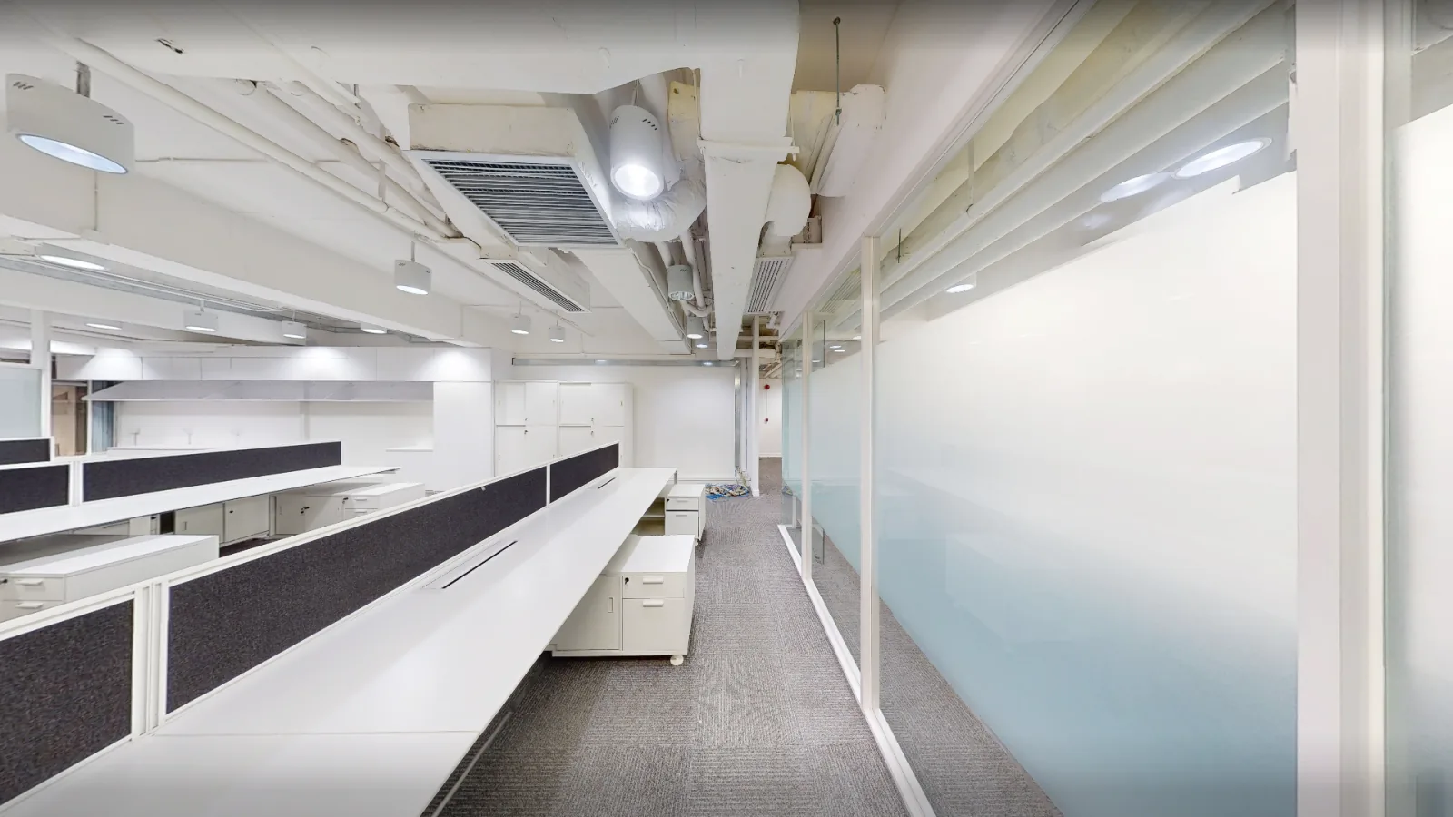 Office at Universal Trade Centre, Central – walkway beside glass-partitioned room