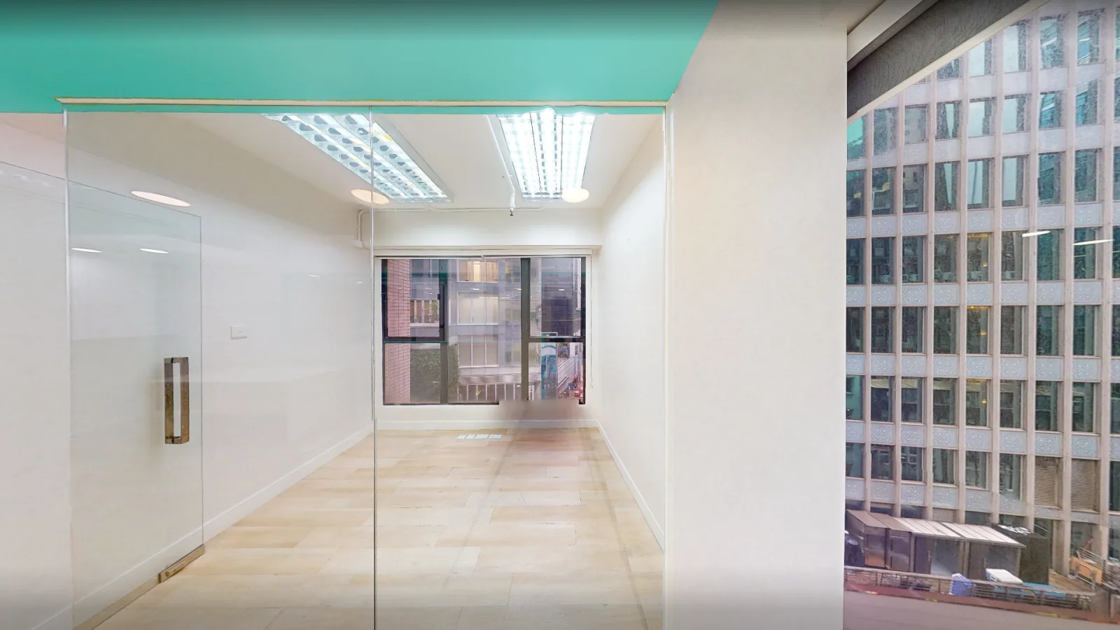 Office at World Trust Tower, Central – glass-partitioned room facing the window