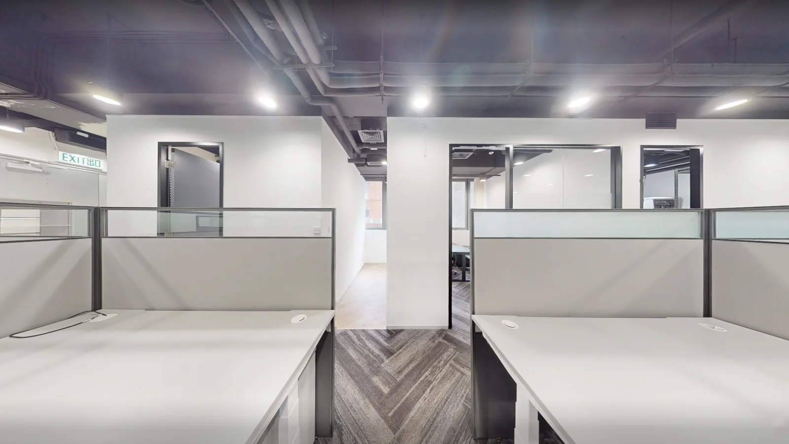 Office at Gravity, Kwun Tong – workstation clusters with herringbone flooring