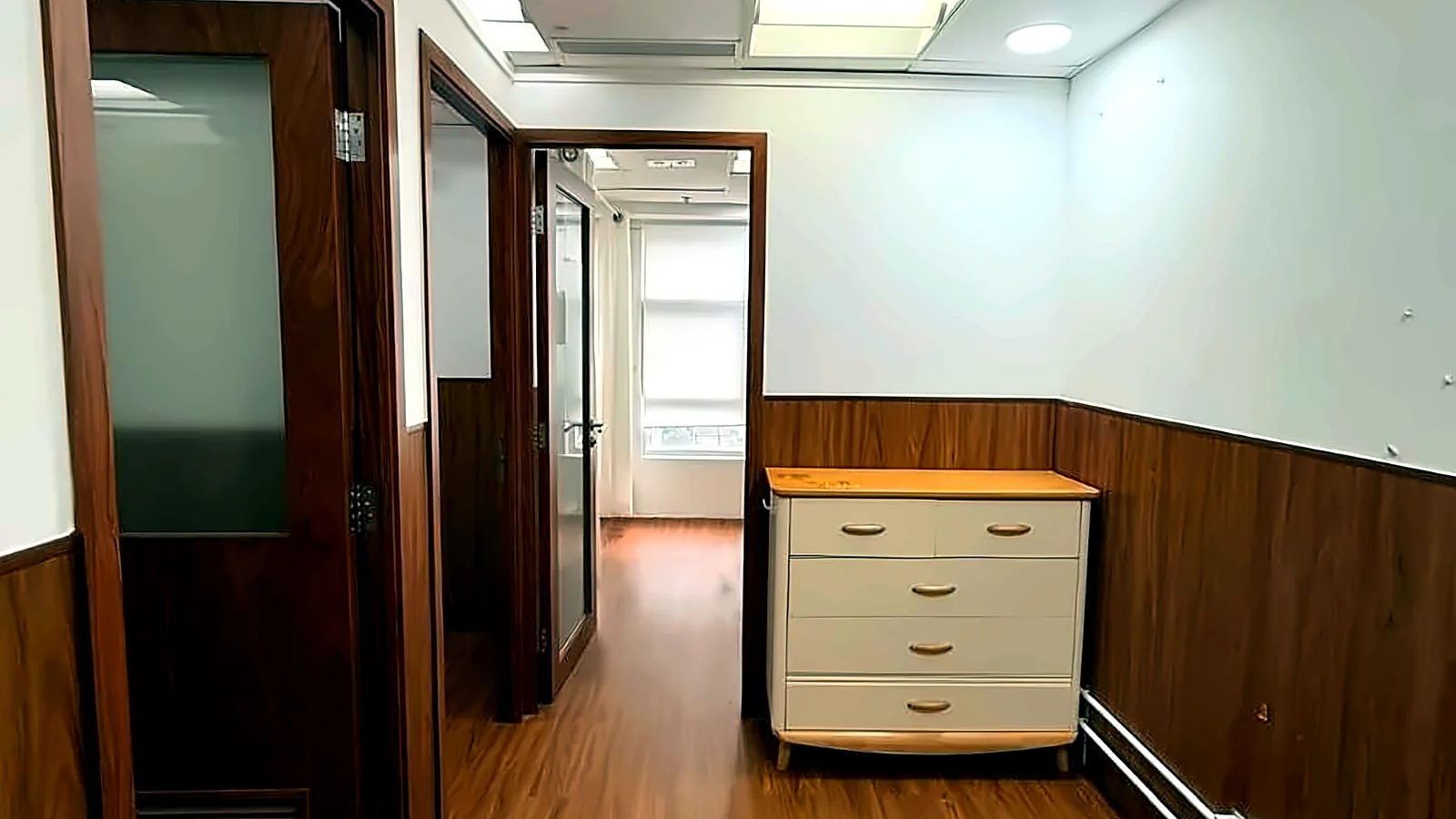 Office at Crawford House, Central – waiting area leading to the rooms