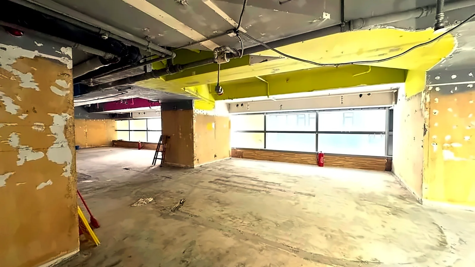 Shop at Island Crest, Sai Ying Pun – bare-shell interior with windows