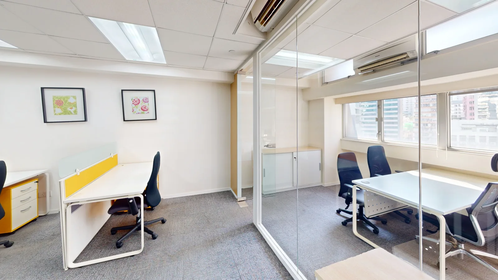 Office for lease on Wing Lok Street, Sheung Wan - desk area toward windows