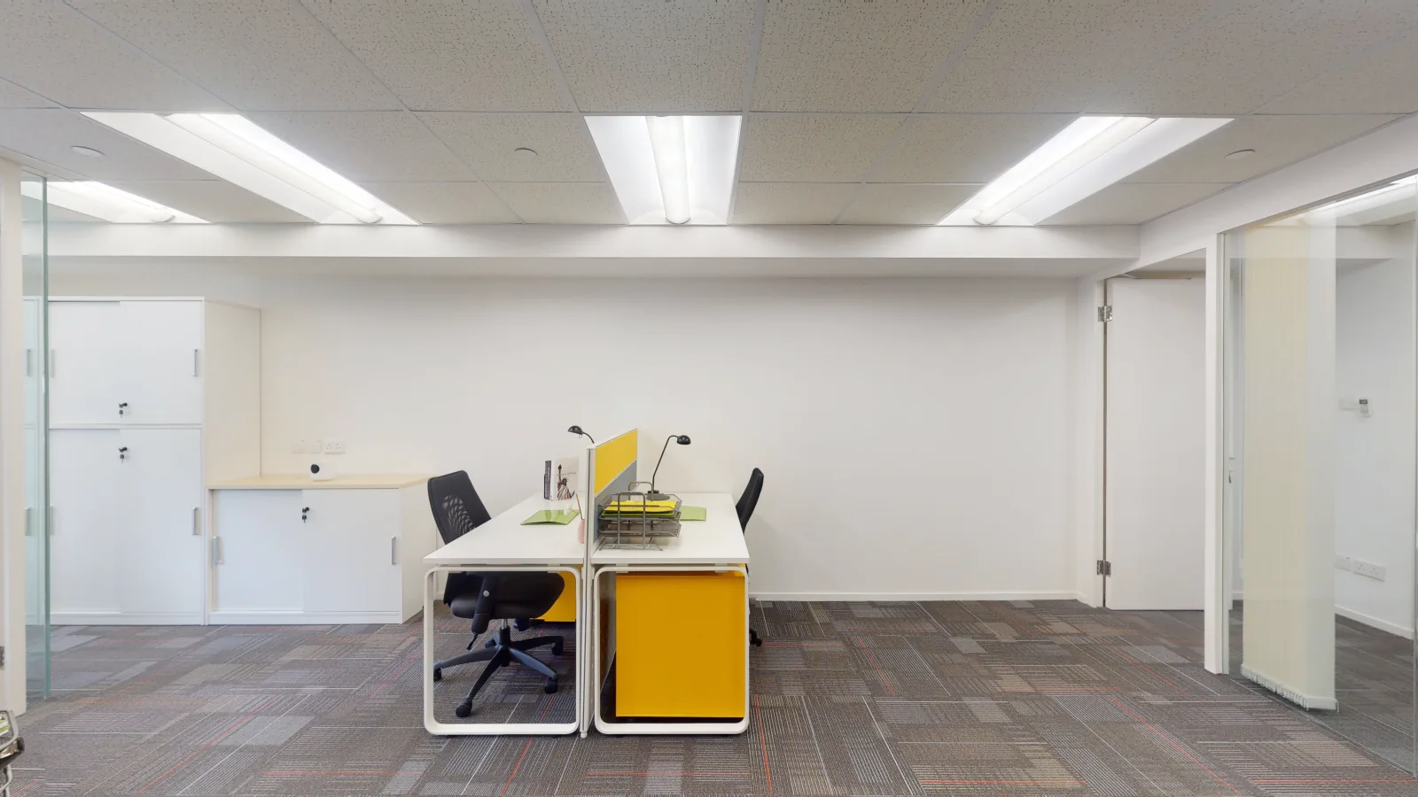 Office for lease on Wing Lok Street, Sheung Wan - desk area toward windows