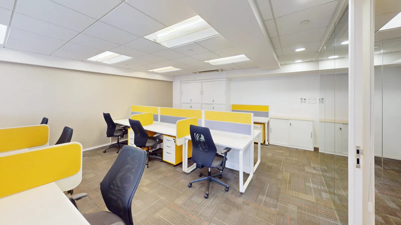Office for lease on Wing Lok Street, Sheung Wan - desk area toward windows