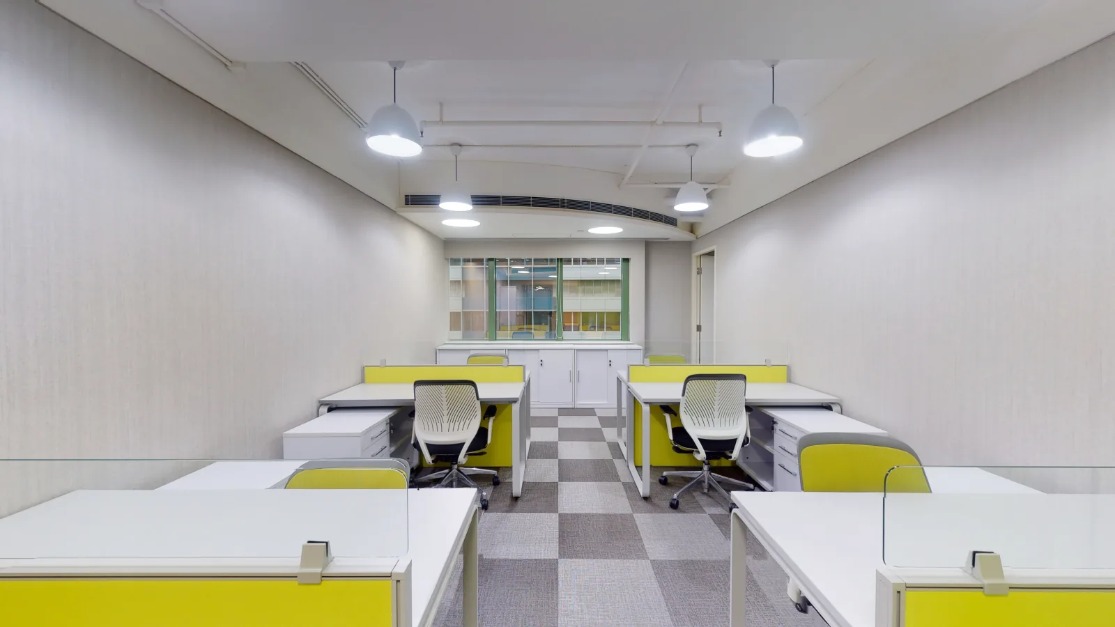Office for lease on Hennessy Road, Wan Chai - desk area toward windows