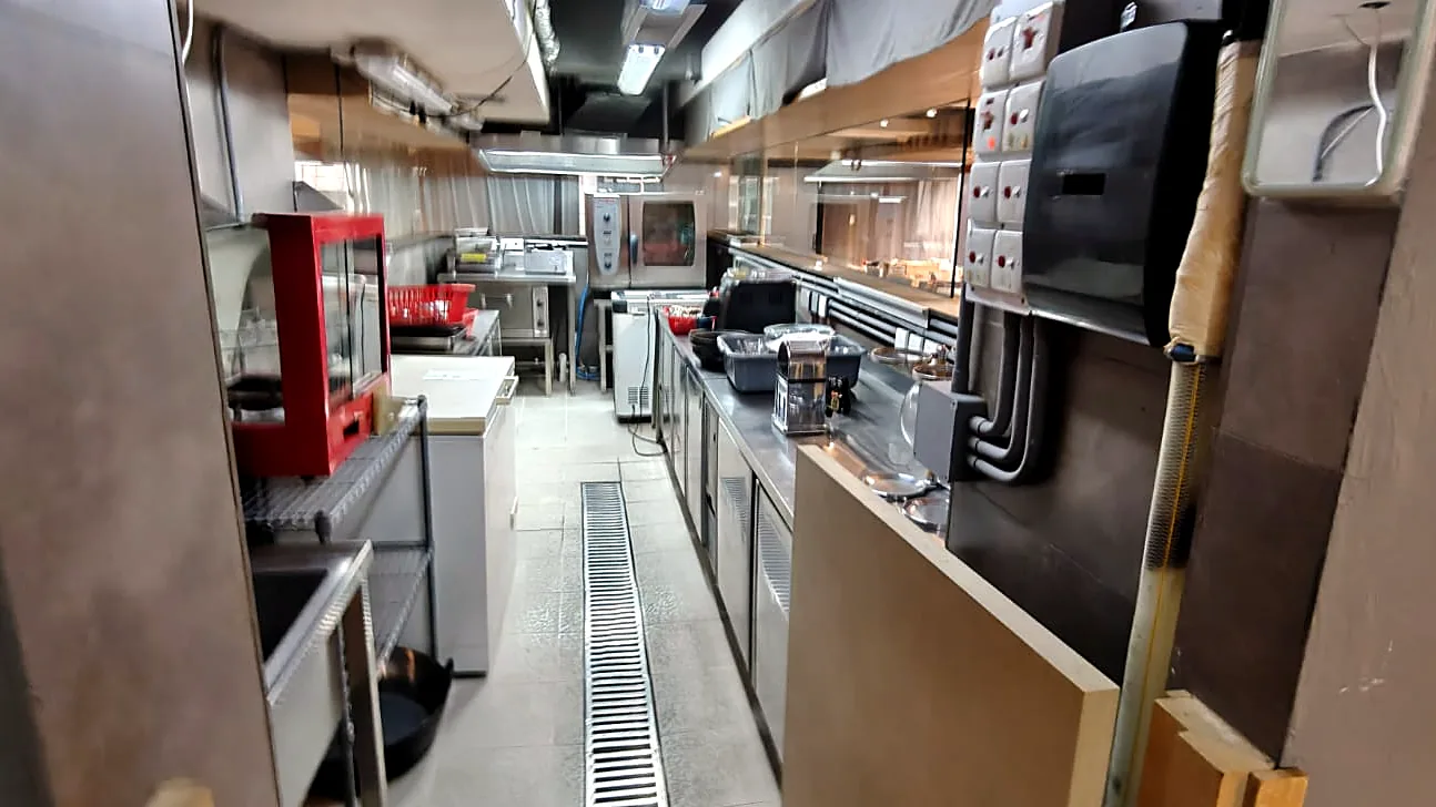 Restaurant at Wellington Place, Central - long kitchen prep aisle