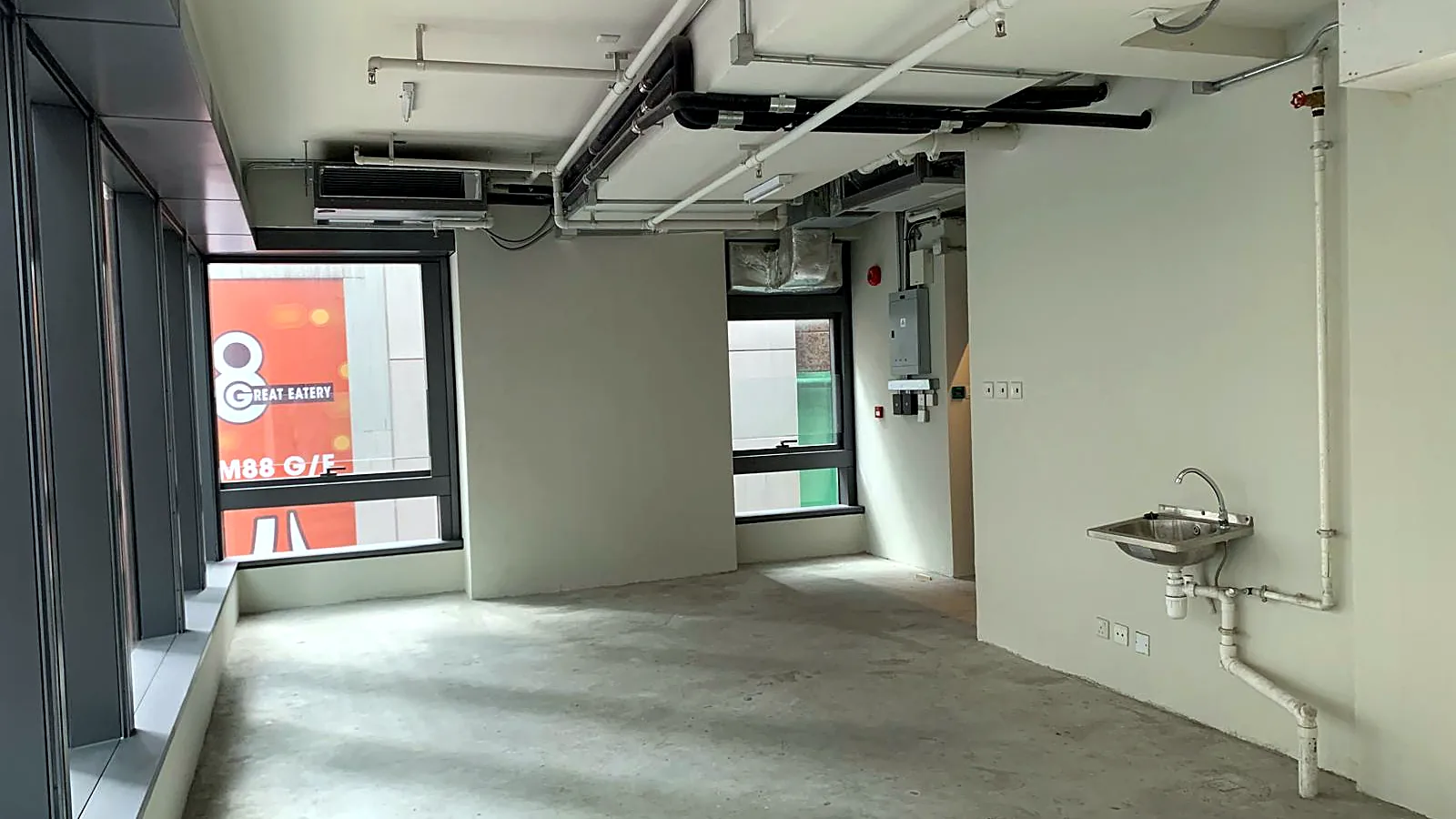 Bare-shell office with windows and pantry sink, Wellington Street, Central
