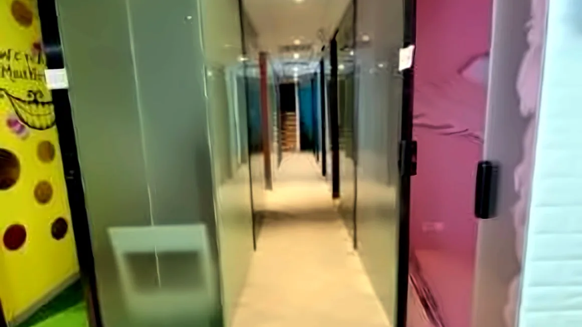 Office at Cubus, Causeway Bay – glass-partition hallway