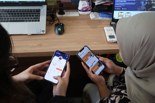 TROOPERS team standing in front of the TROOPERS logo during the company's founding in July 2017