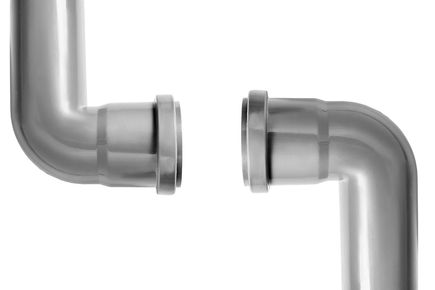 Two gray plastic L-shaped drain pipes with flanged ends isolated on a white background.