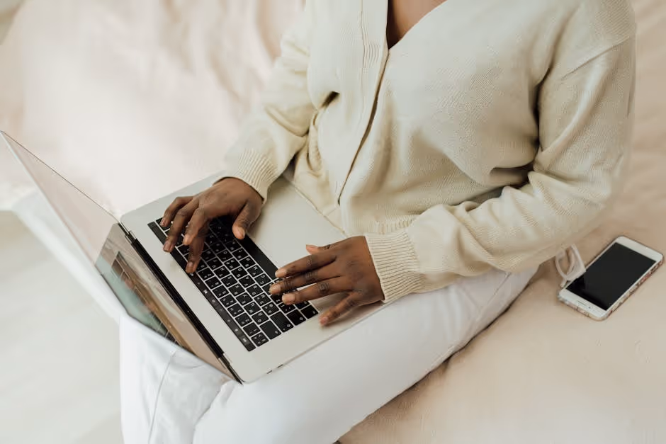 person working on a laptop in a casual home setting - cheap franchises under $1000