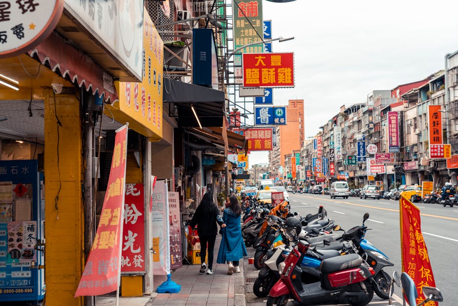 busy retail street with diverse storefronts - site selection and analysis