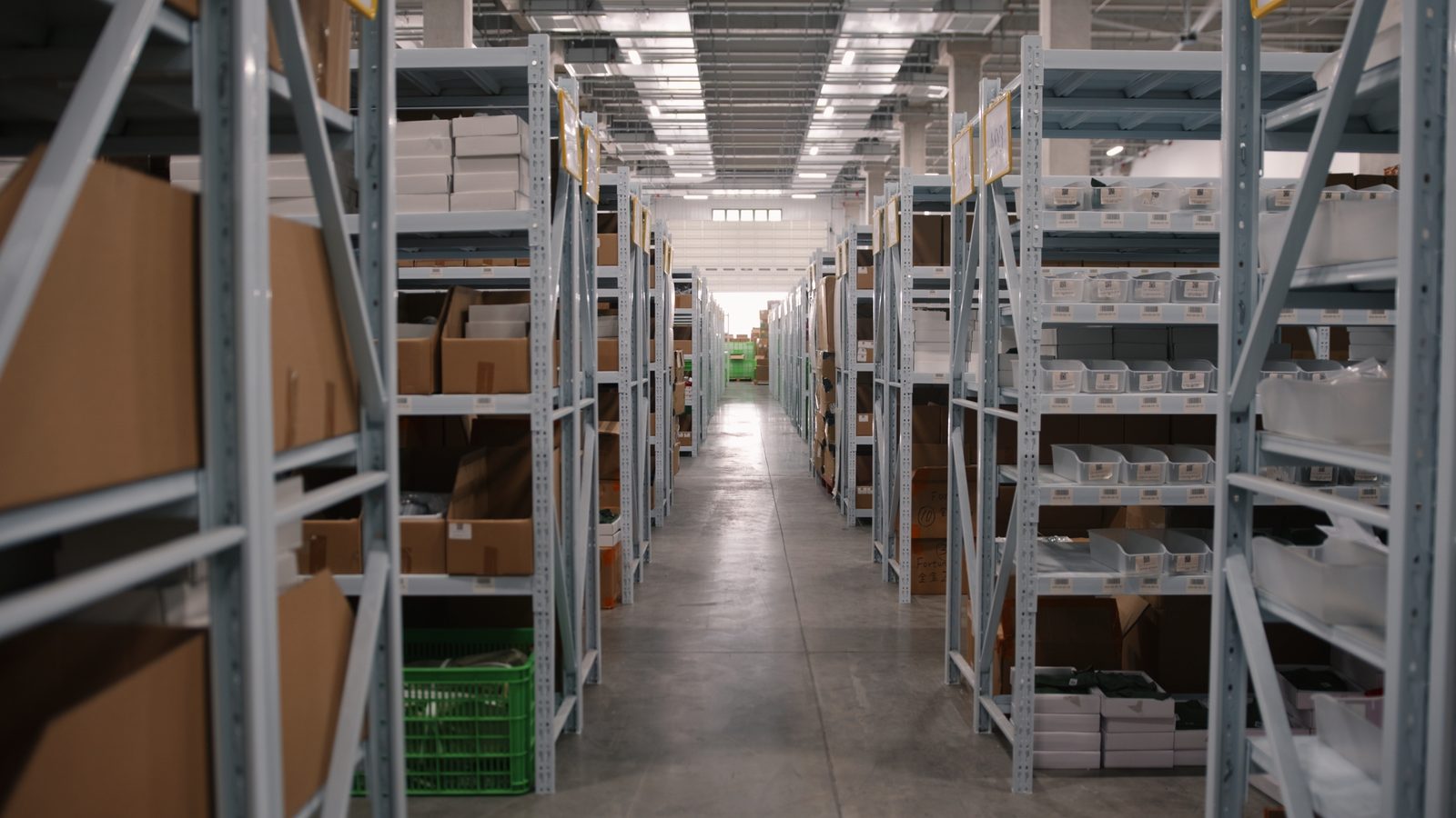 A shelf aisle in the Commercive warehouse