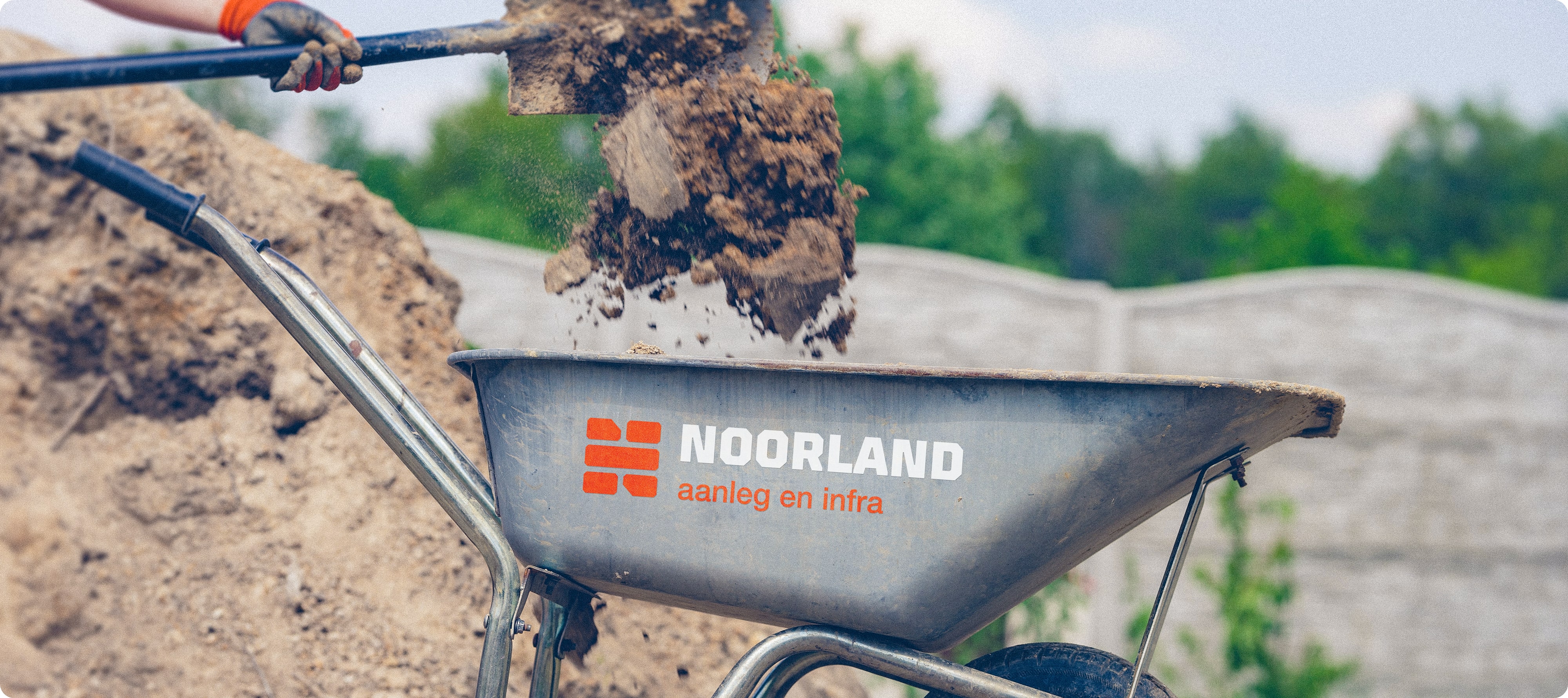 Noorland Logo op kruiwagen