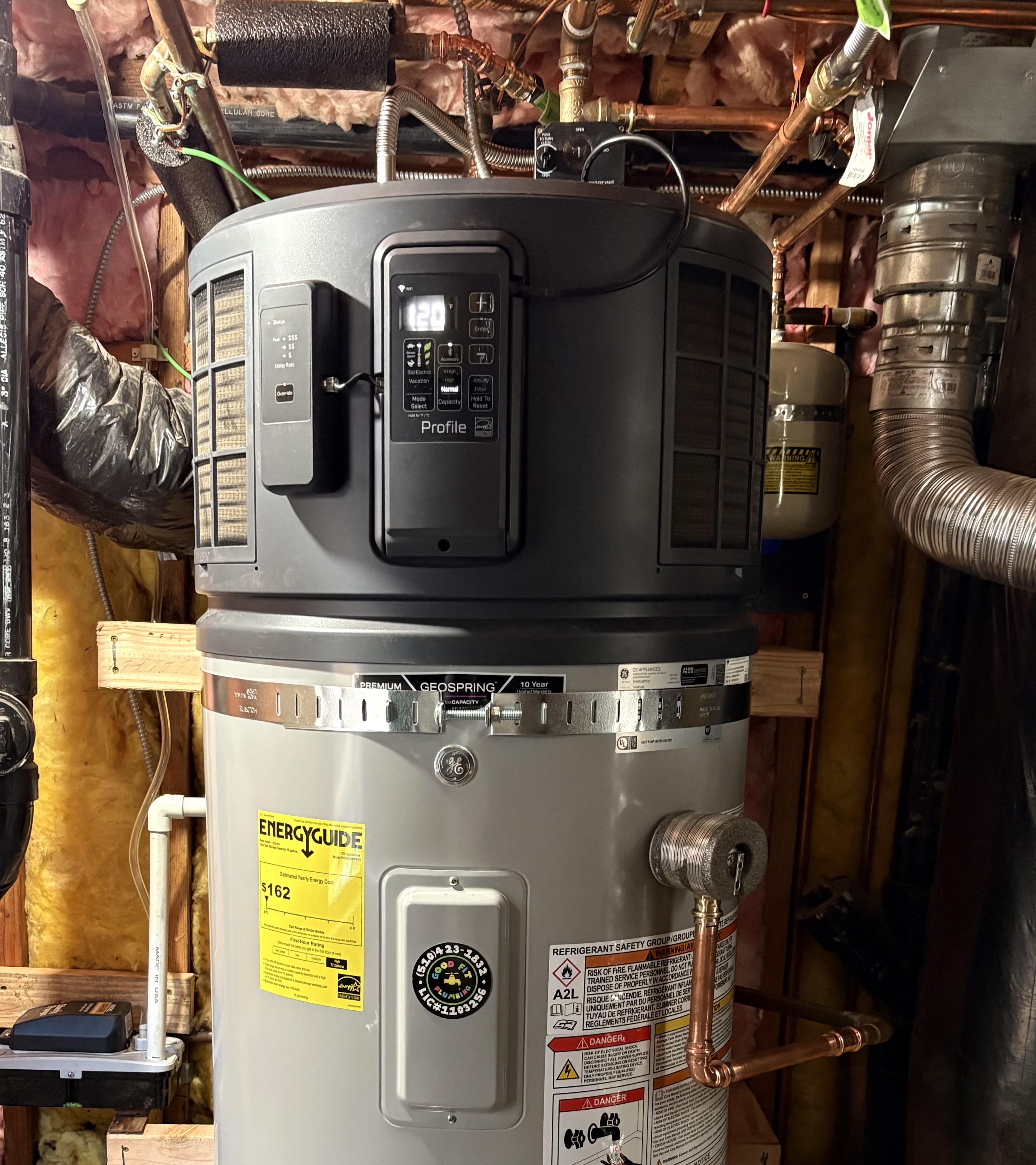Professionally installed residential water heater, highlighting the Good Fit Plumbing brand's water heater installation and maintenance services.