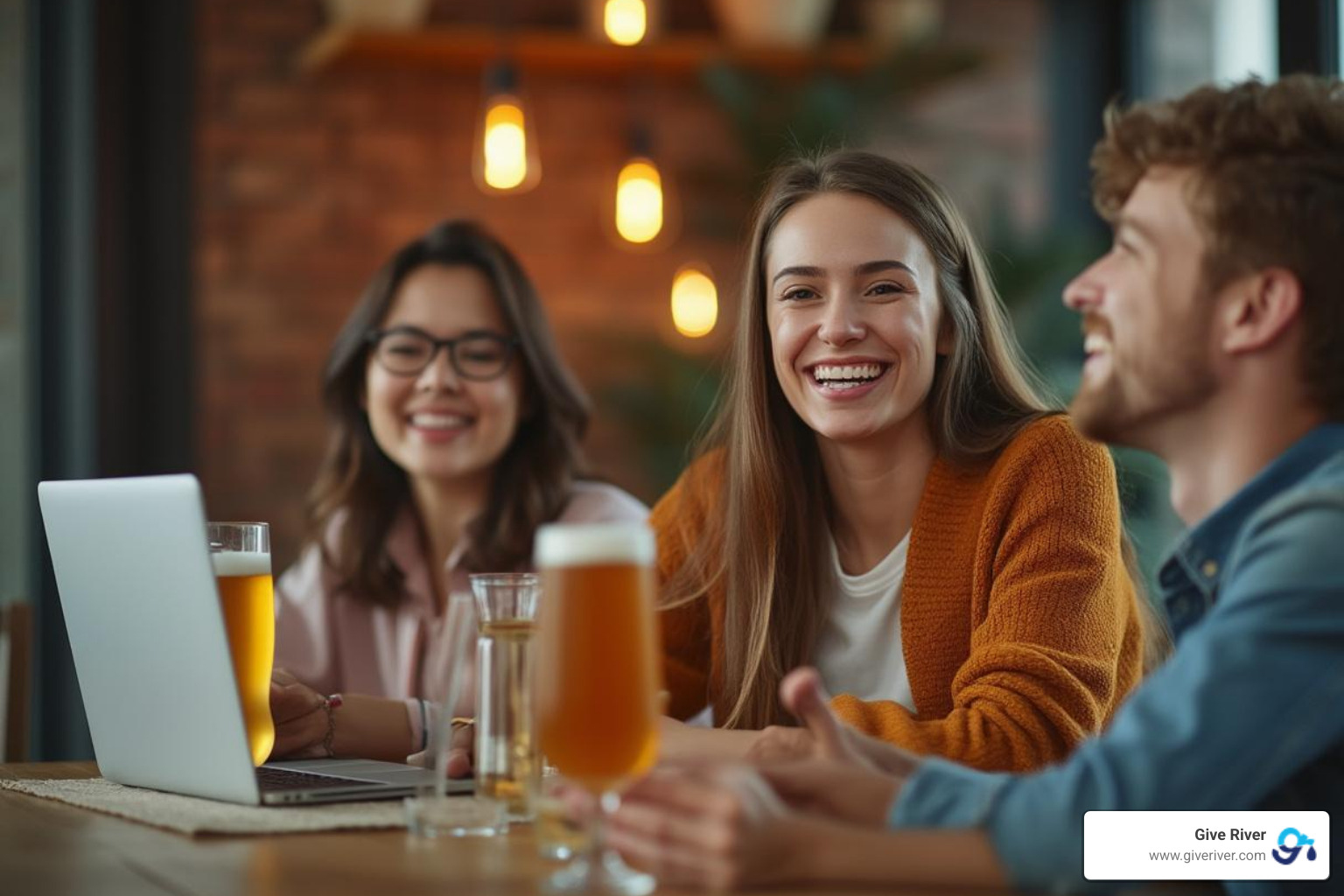 A remote employee smiling during a virtual team event with a happy hour kit in front of them - employee engagement gifts A remote employee smiling during a virtual team event with a happy hour kit in front of them - employee engagement gifts