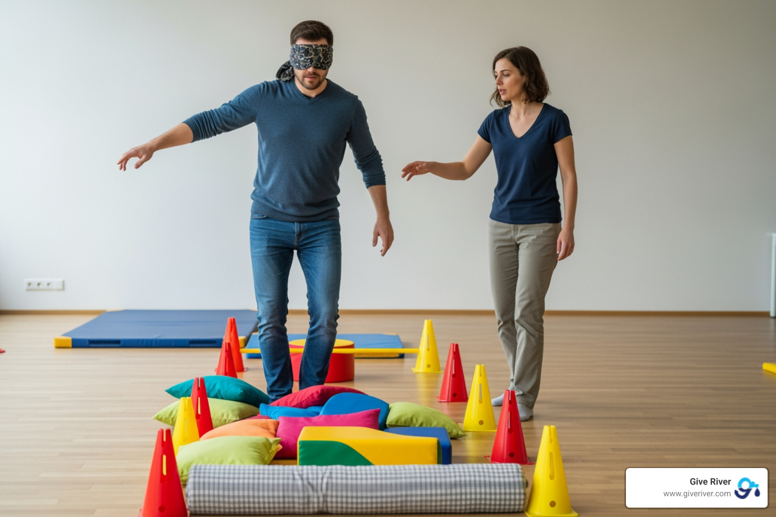 team navigating a blindfolded obstacle course - blindfold activity on communication