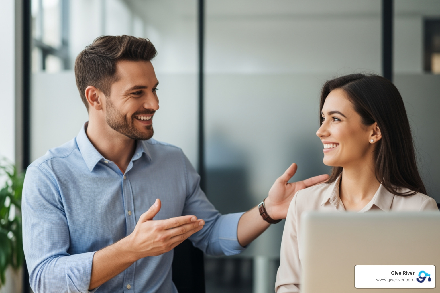 manager praising employee - compensation and reward system