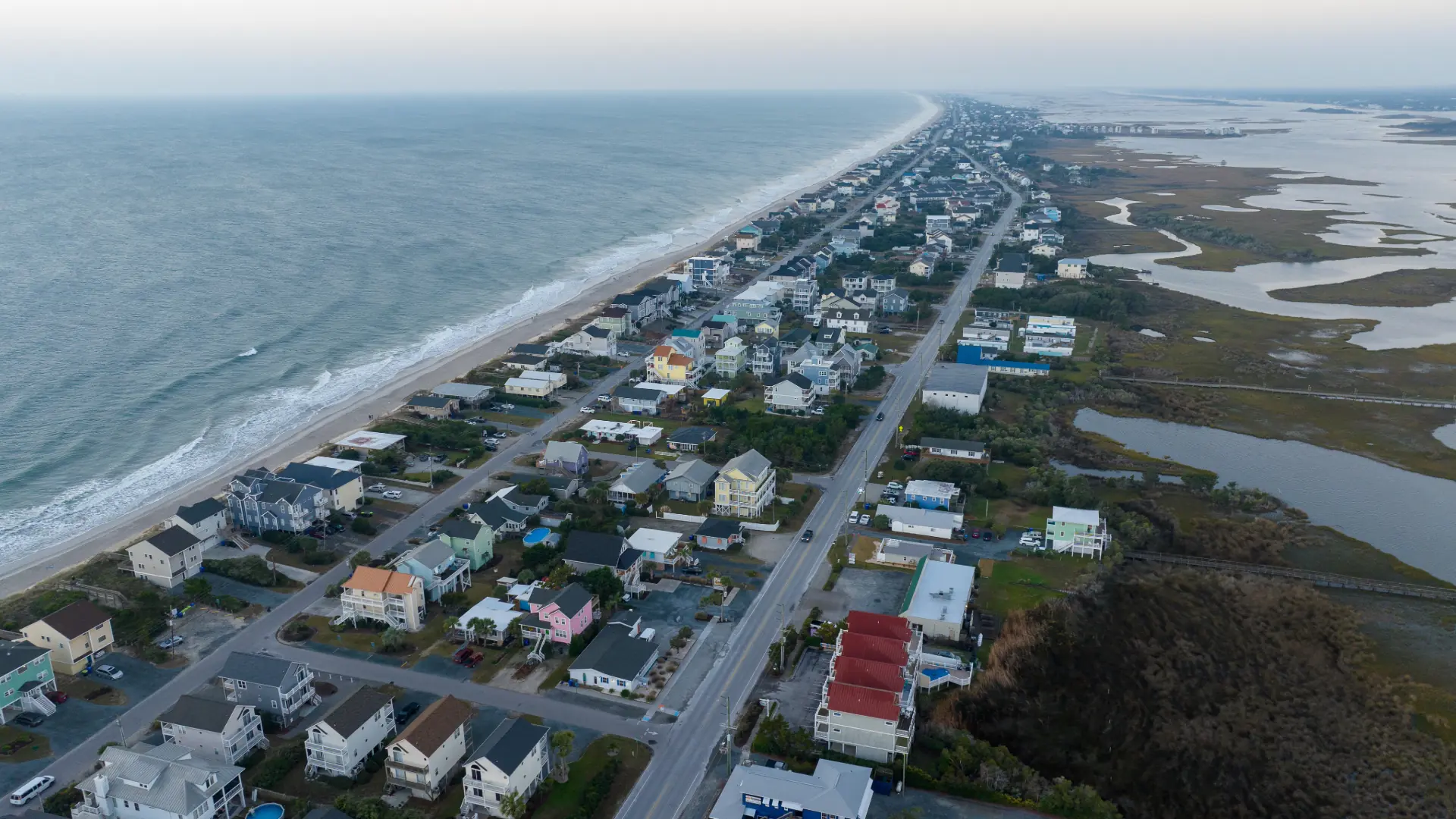 Aerial view of Surf City, North Carolina, between the ocean and the marsh