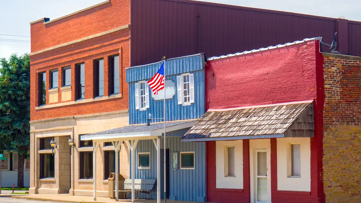 Brick downtown buildings housing small businesses on a main street