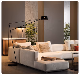 Commercial + Hospitality Interior Design Services: A white couch with a lamp on it. Stacy Nicole Interiors is a full-service North Carolina interior design firm. Luxury interior design in Charlotte-based at 1515 Mockingbird Lane, Suite 420, Charlotte, NC 28209