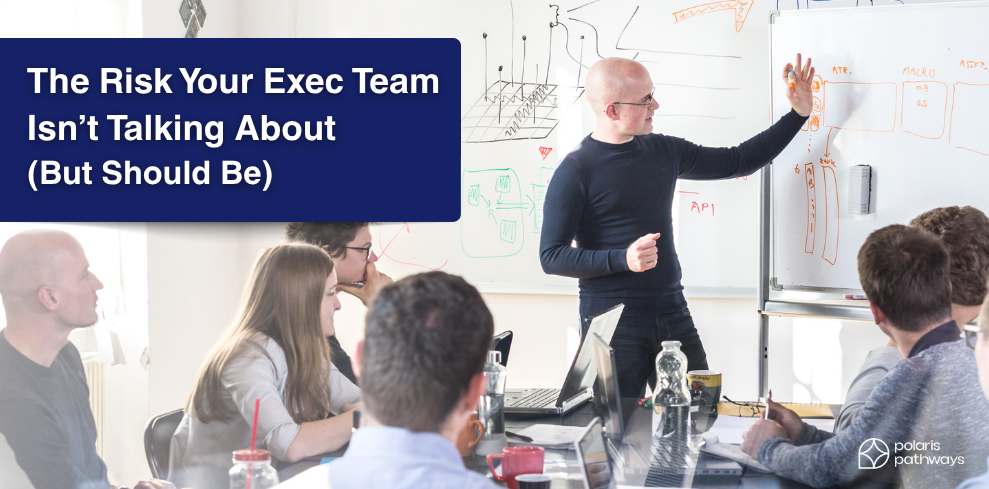 Exec team meeting with leader at whiteboard and overlay text: The Risk Your Exec Team Isn’t Talking About