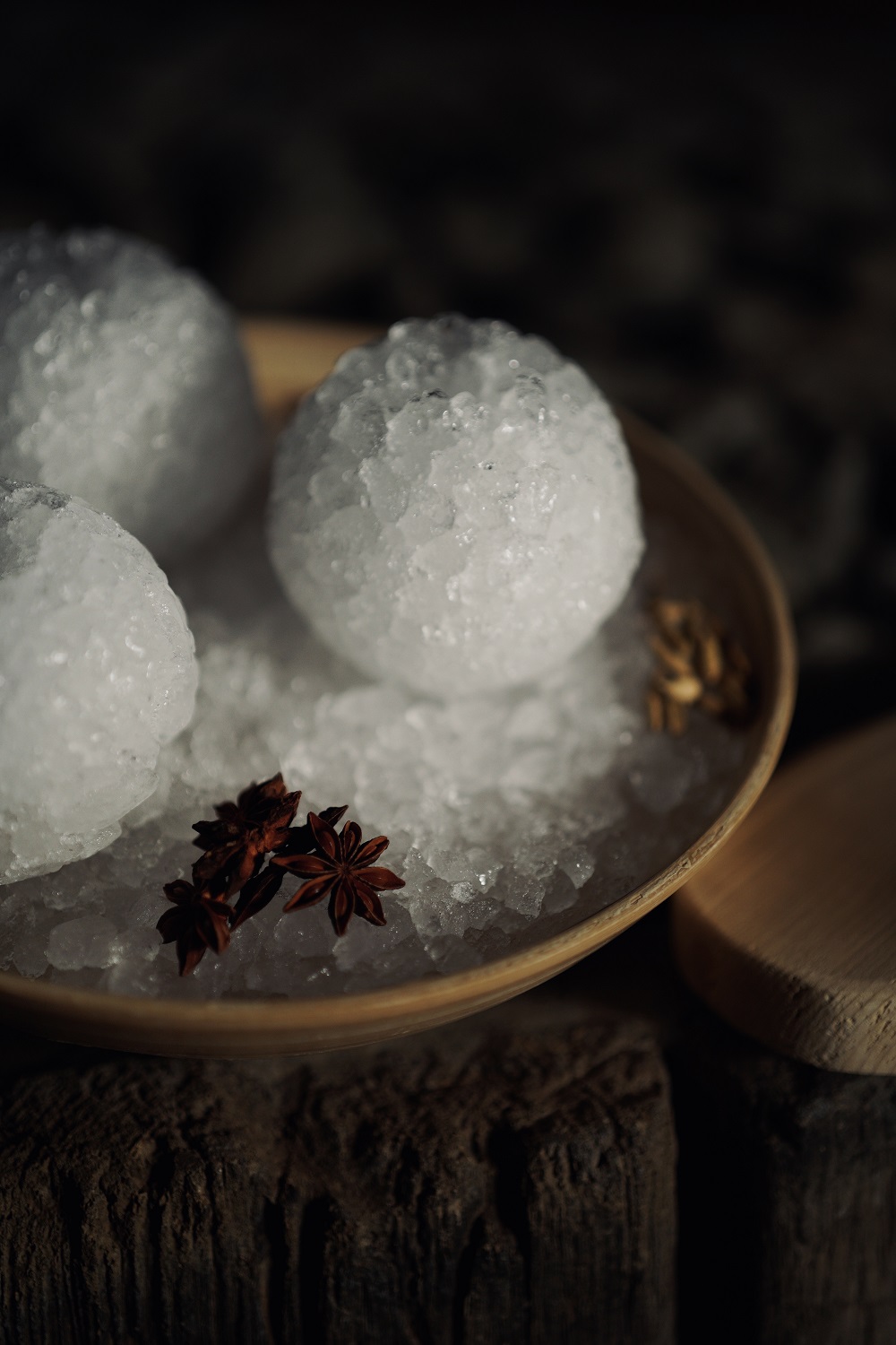 Ice balls for infusions in kelo sauna with winter herbs such as star anise