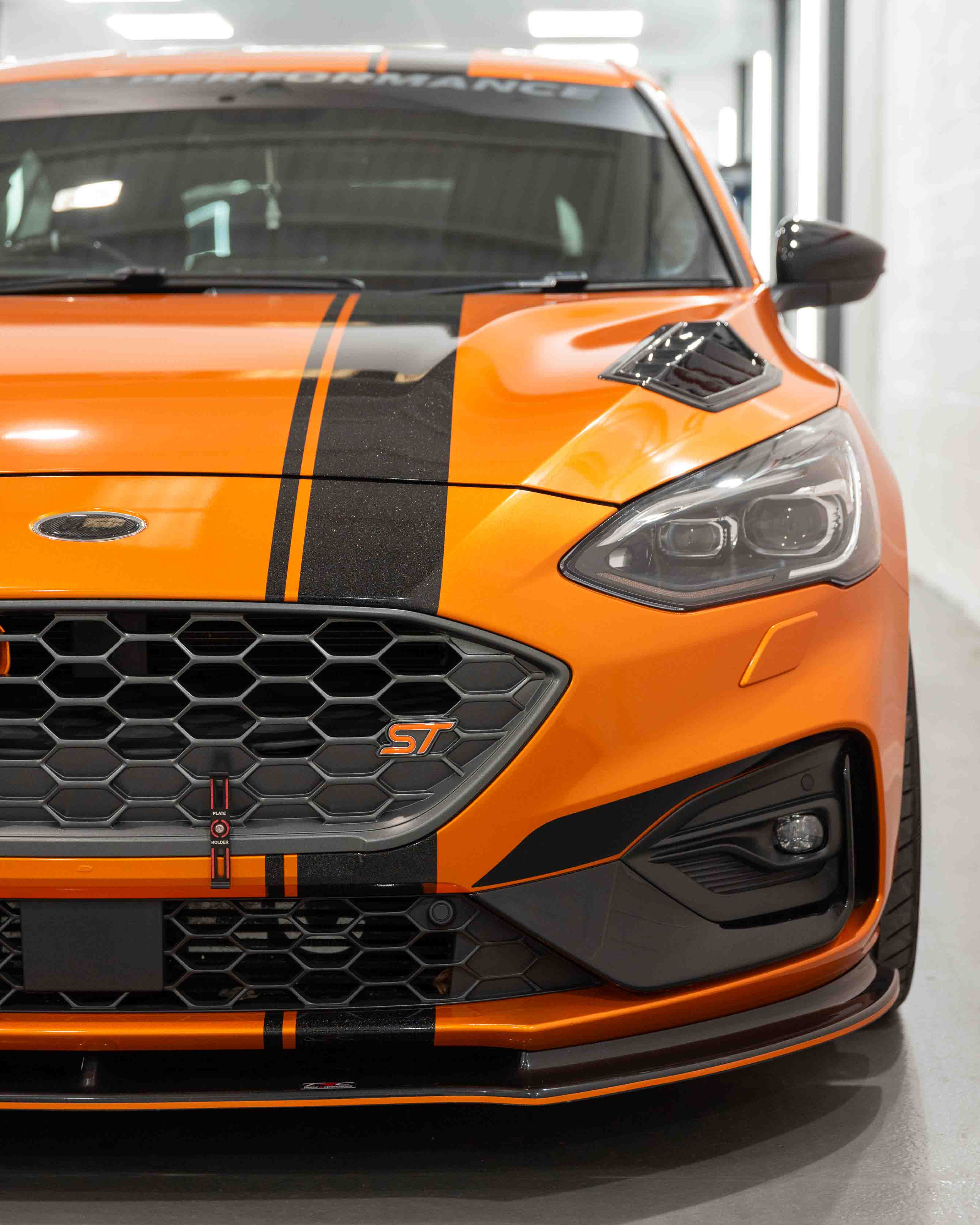 Example image of a Rolls Royce with Dechrome on the doors trims and grill area