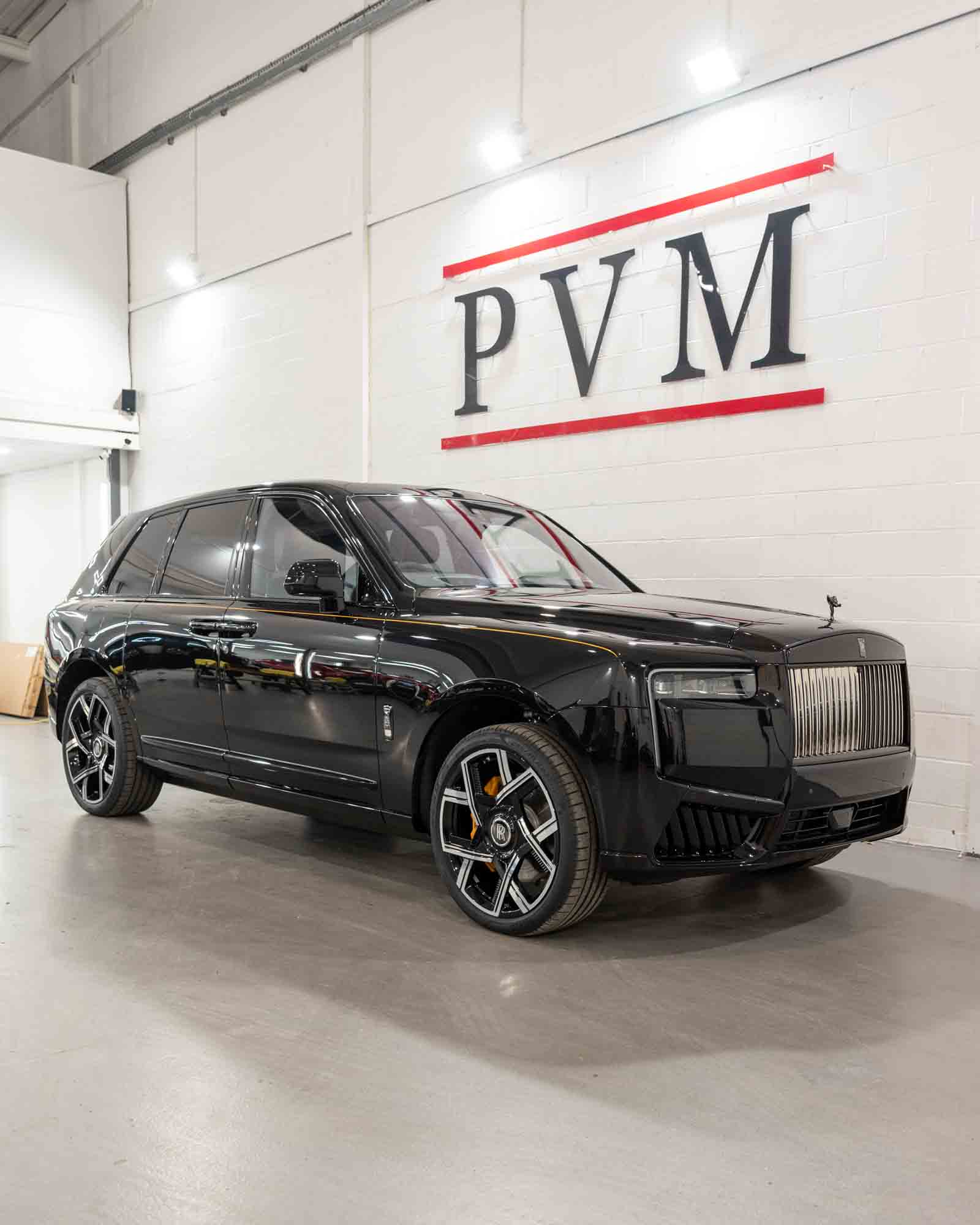 Example image of a Rolls Royce with Dechrome on the doors trims and grill area