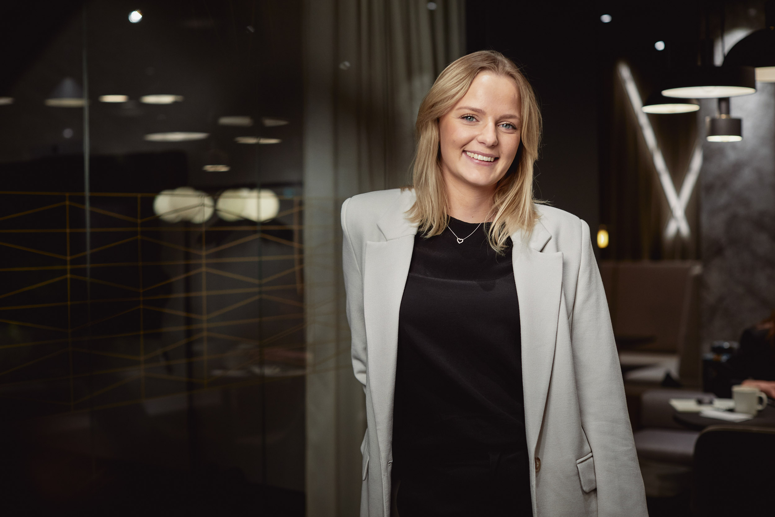 capa member beside a glass wall