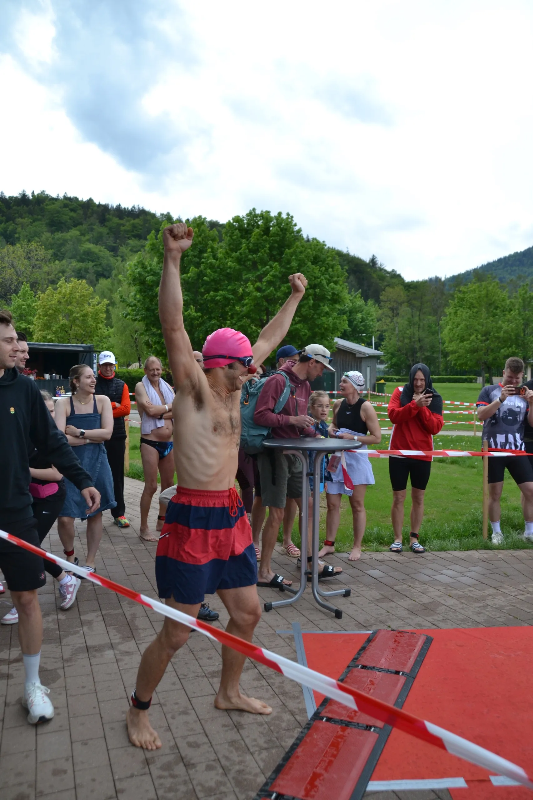 Participant celebrating at the 2026 RISK MAN finish line