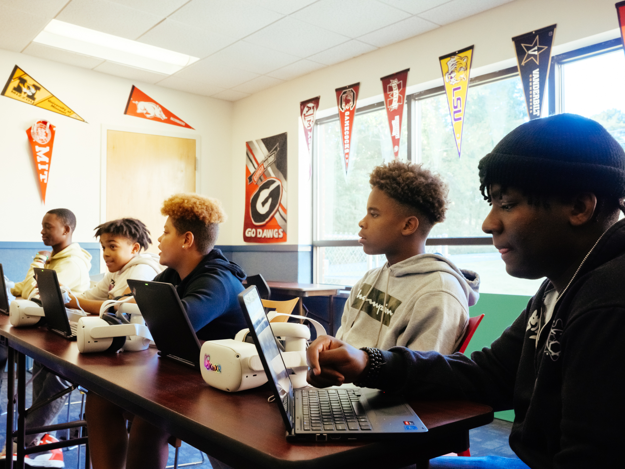 Multiple students learning on laptops