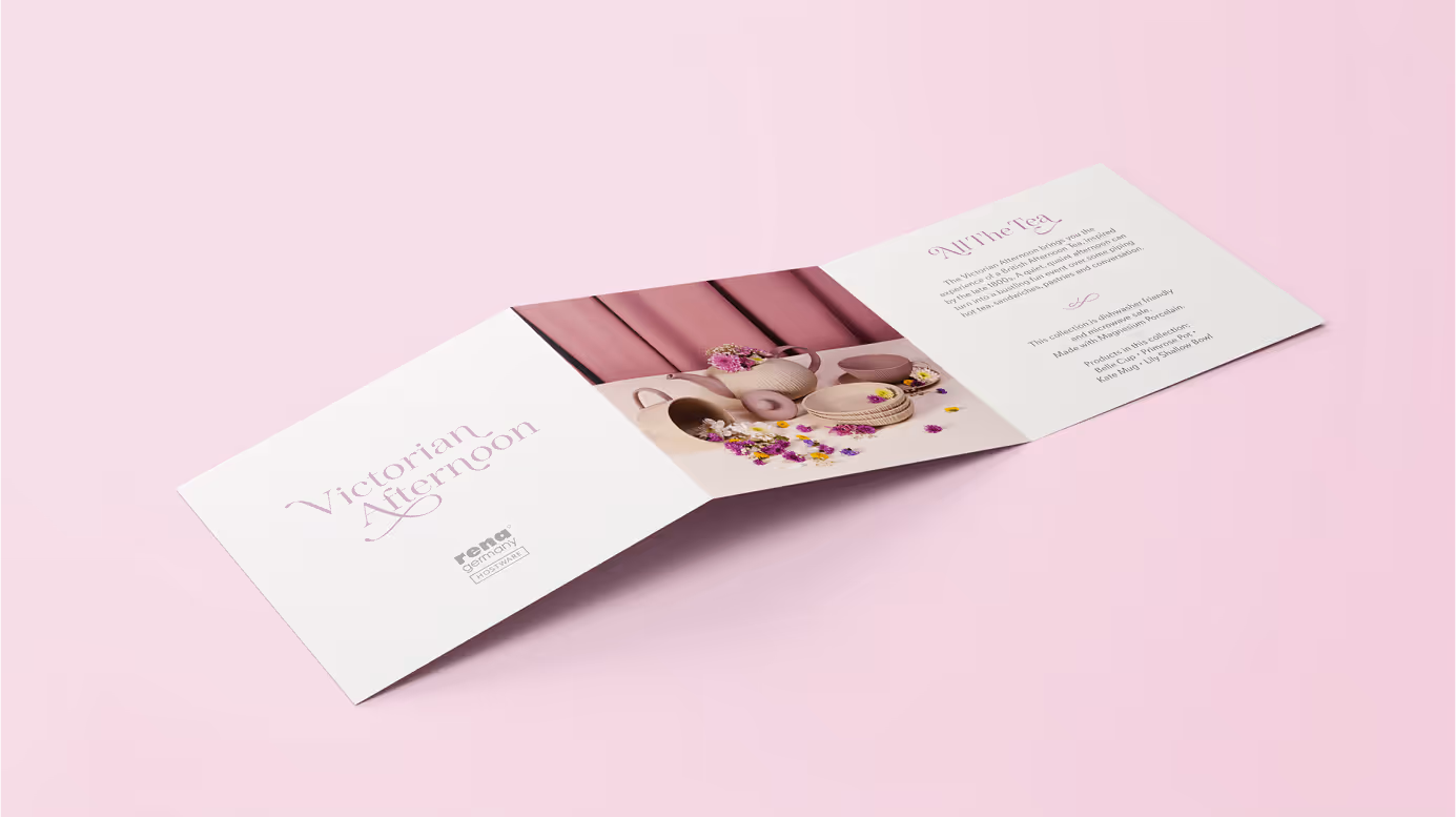 Folded brochure titled Victorian Afternoon, featuring pastel-colored pottery and dried flowers on a pink background.
