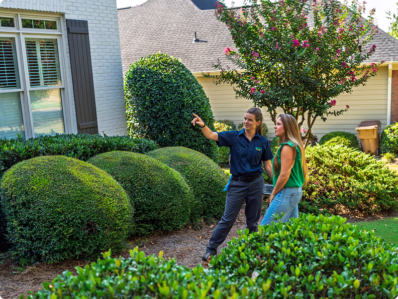georgia pest control technician with a customer