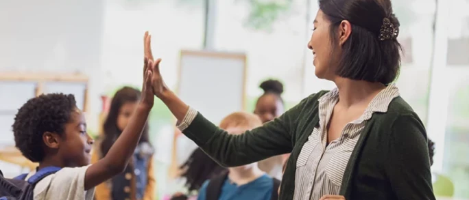 teacher high five student
